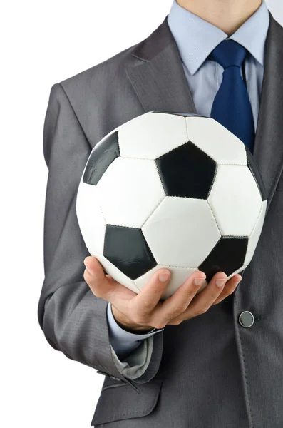 Бізнесмен тримає футбол на білому — стокове фото