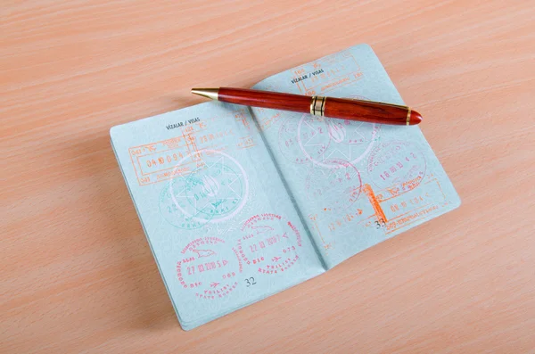 Паспорт с штампами аэропорта — стоковое фото