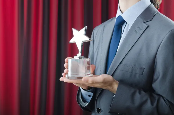 Empresário galardoado com prémio de estrela — Fotografia de Stock