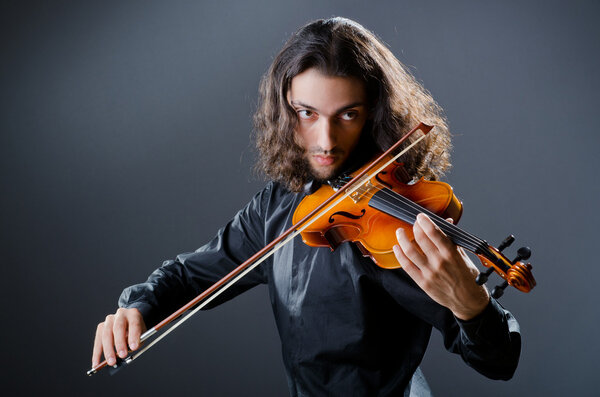 Violin player playing the intstrument