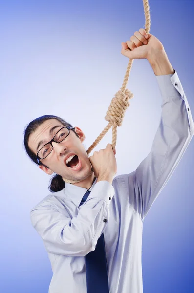 Businessman committing suicide through hanging — Stock Photo, Image