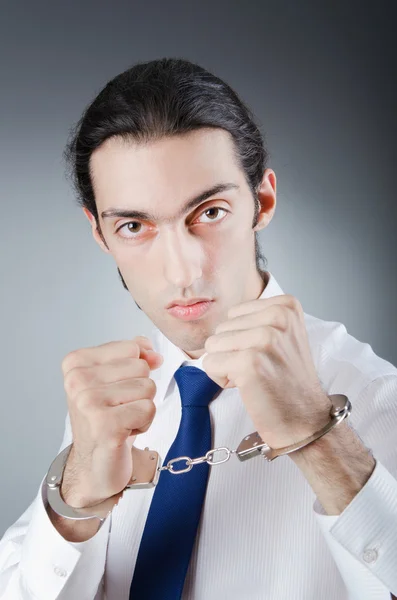 Businessman handcuffed for his crimes — Stock Photo, Image