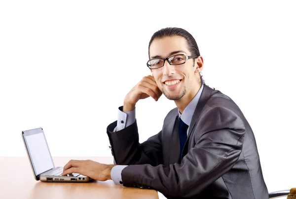 Affärsman som sitter vid skrivbordet — Stockfoto