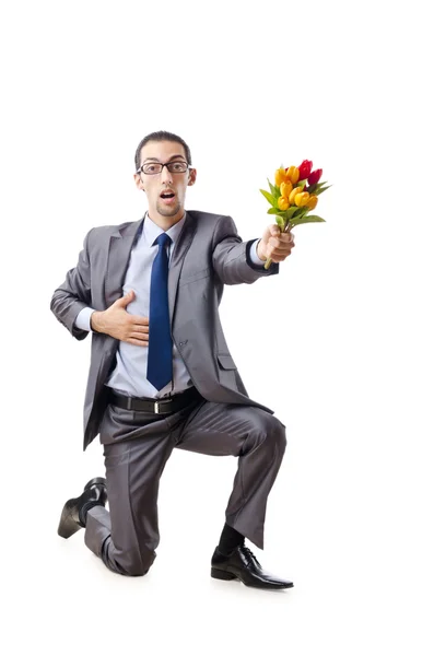 Uomo d'affari che offre fiori di tulipano — Foto Stock