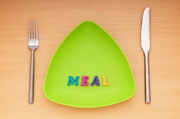 Plate with letters on the white background — Stock Photo, Image