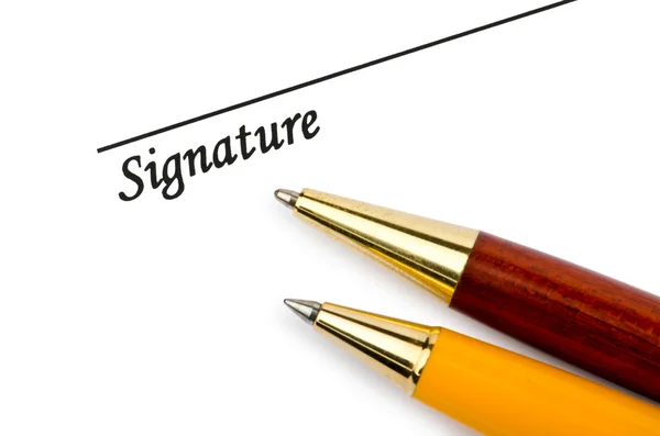 Ручка і підпис ізольовані на білому — стокове фото