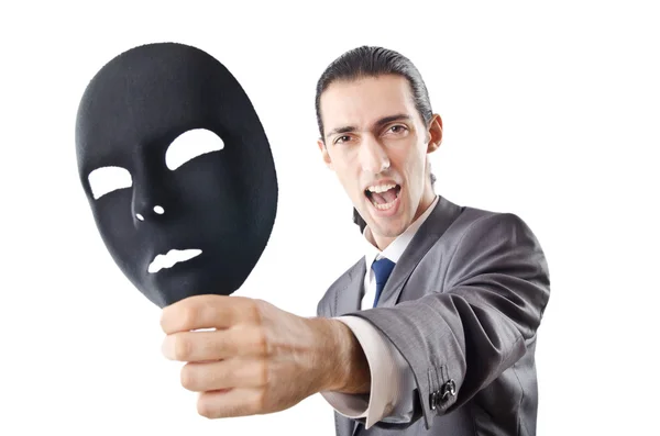 Концепция промышленного шпионажа с бизнесменом в маске — стоковое фото