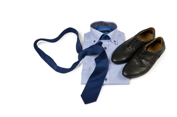 Stock image Shoes and shirt with tie on white