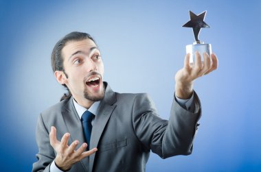 Businessman awarded with star award clipart