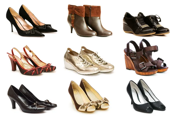 白で隔離される様々 な靴のコレクション — ストック写真