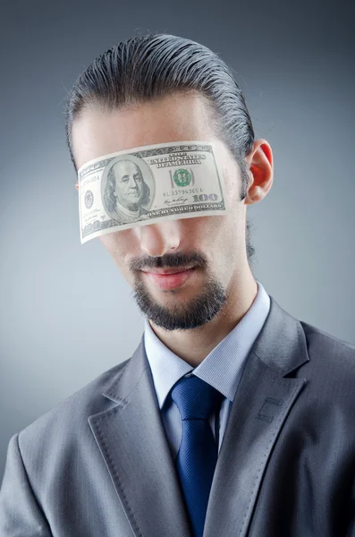 Businessman blinded with money — Stock Photo, Image