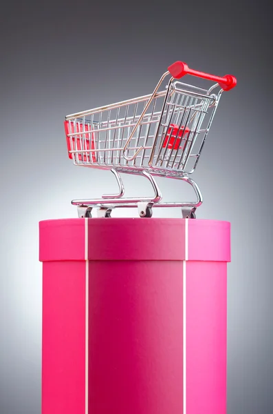 Christmas shopping concept with shopping cart Royalty Free Stock Photos