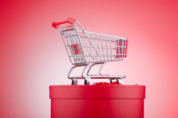 Christmas shopping concept with shopping cart Royalty Free Stock Images