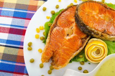 Roasted salmon in the plate clipart