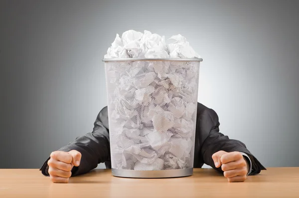 stock image Man with lots of wasted paper