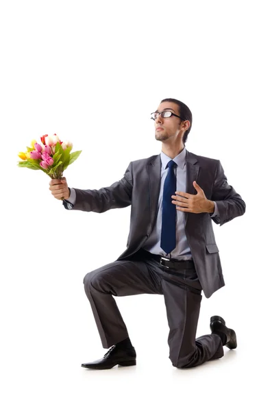 Homme d'affaires offrant des fleurs de tulipes — Photo