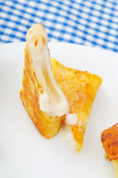 Custard filled pancake in plate — Stock Photo, Image