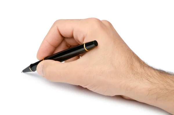 Рука с ручкой на белом Стоковое Фото