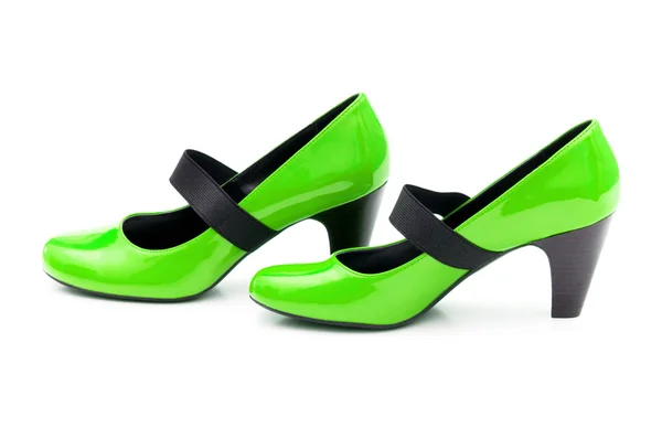 Gröna kvinnliga skor på vit bakgrund — Stockfoto