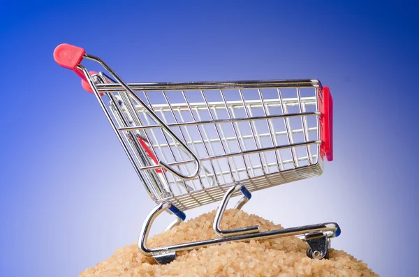 Shopping cart against gradient background — Stock Photo, Image