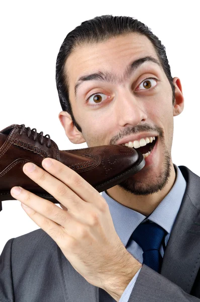 Człowiek z szeroką gamą obuwia — Zdjęcie stockowe
