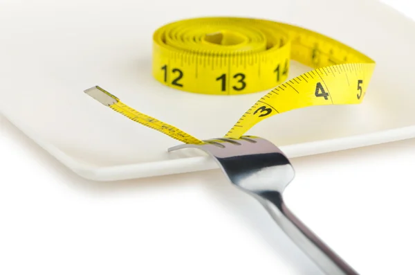 Dieetconcept met vork en meter — Stockfoto