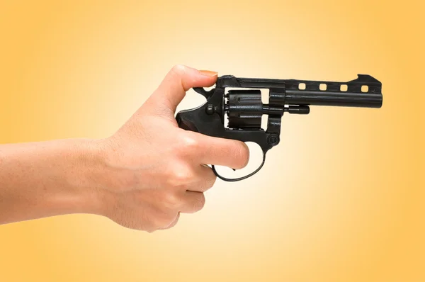 stock image Hand holding revolver isolated on the white