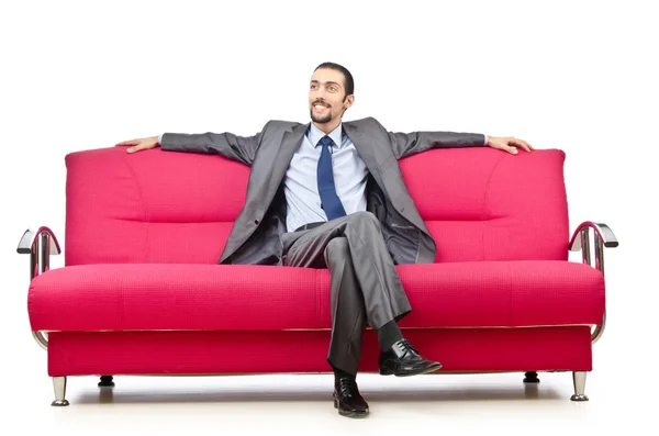 Hombre sentado en el sofá —  Fotos de Stock