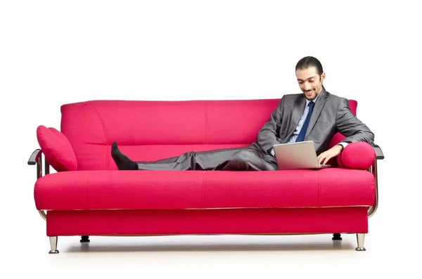 Az ember ül a kanapén — Stock Fotó