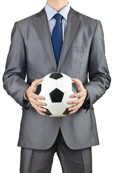 Empresário segurando futebol em branco — Fotografia de Stock