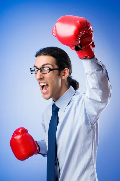 Homem de negócios com luvas de boxe — Fotografia de Stock