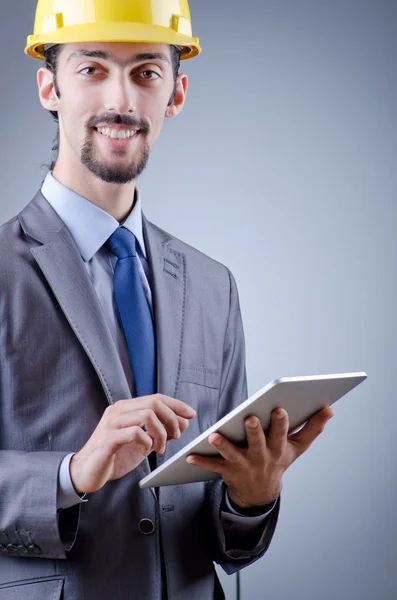 stock image Construction worker working on tablet