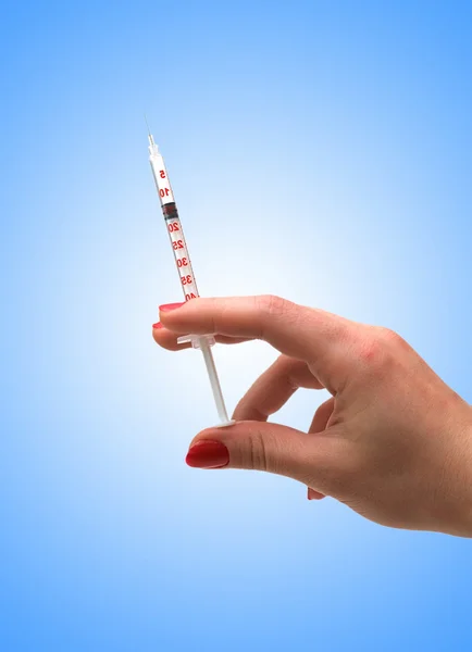 Ručně držená injekční stříkačka izolovaná na bílém — Stock fotografie