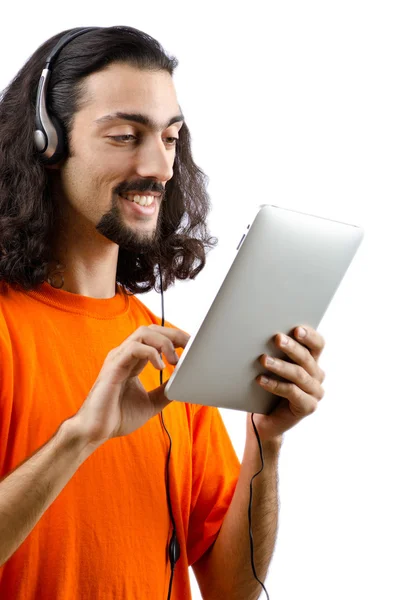 Estudante ouvir música com computador tablet — Fotografia de Stock