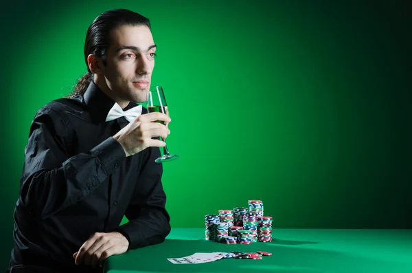 stock image Man playing in the casino