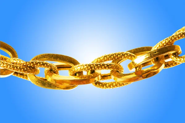 Golden jewellery against gradient background — Stock Photo, Image