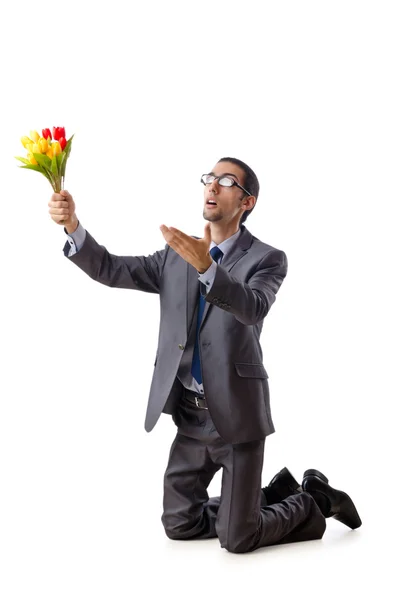 Geschäftsmann bietet Tulpenblumen an — Stockfoto