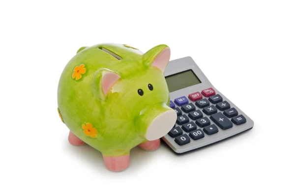 Calculadora e porquinho banco em branco — Fotografia de Stock