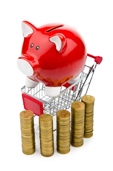 Piggy bank and shopping cart on white — Stock Photo, Image