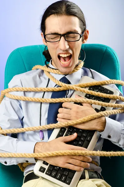 Giovane uomo d'affari legato con corda — Foto Stock