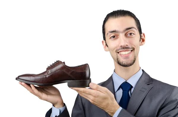 Homme avec une sélection de chaussures — Photo