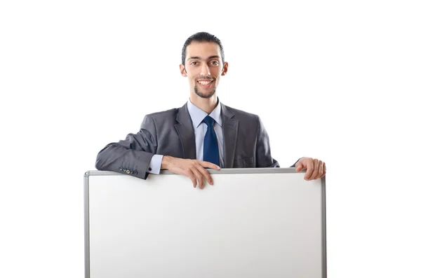 Young businessman with white board — Stock Photo, Image