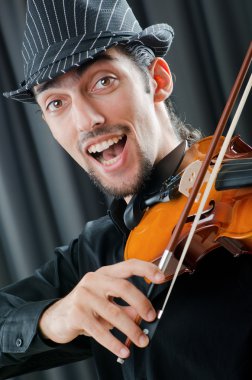 Violin player playing the intstrument clipart