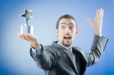 Businessman awarded with star award clipart