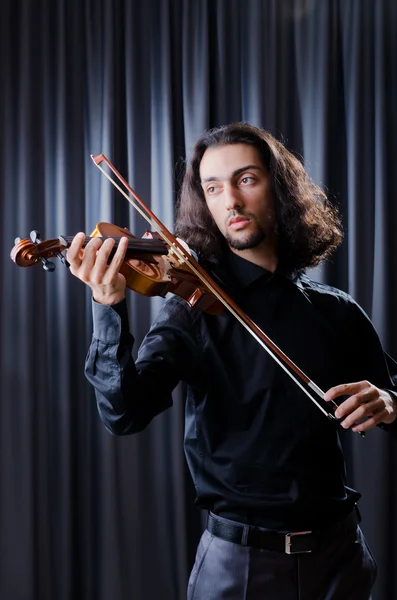 stock image Young violin player playing