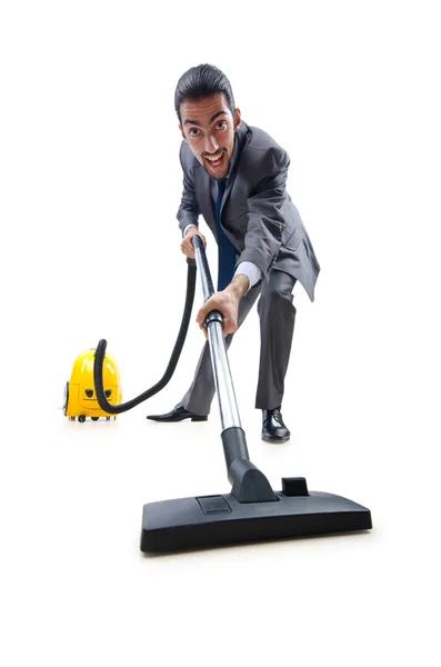 Businessman with vacuum cleaner on white — Stock Photo, Image