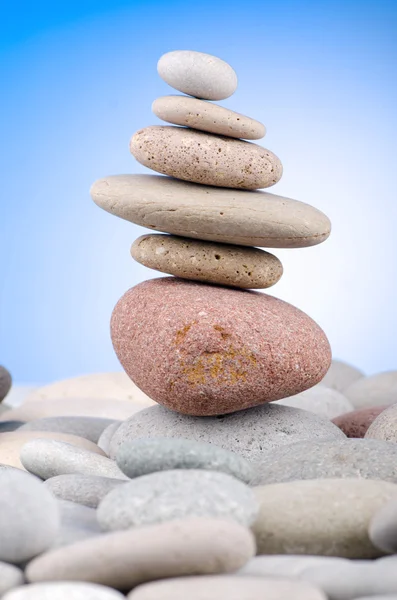 stock image Pebbles stack against gradient background