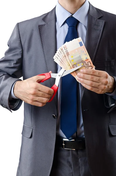 Man cutting money on white — Stock Photo, Image