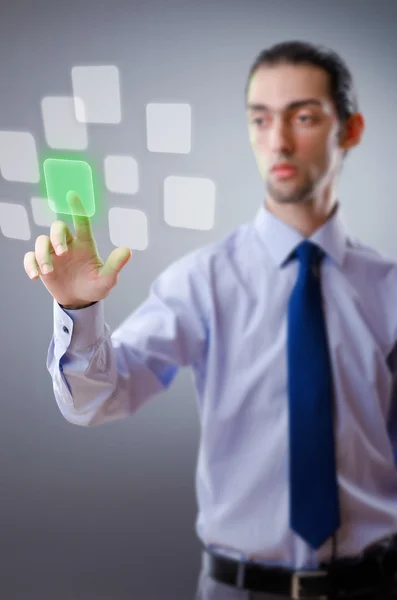 Businessman pressing virtual buttons — Stock Photo, Image