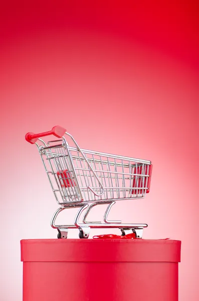 Christmas shopping concept with shopping cart Stock Picture